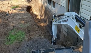 foundation-excavation Excavator Digging Around Foundation Photo